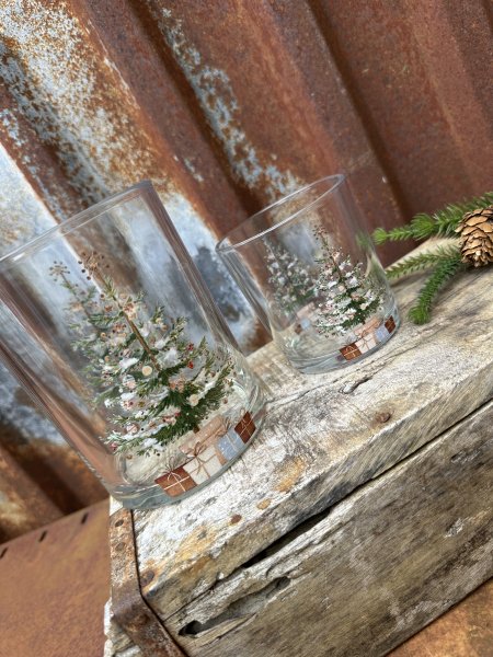 Ljuslykta i glas med julgran