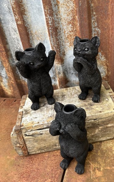 Söt svart ljusstake katt 