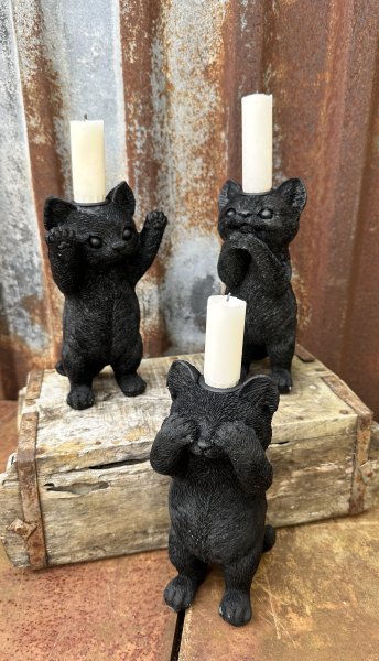 Söt svart ljusstake katt 