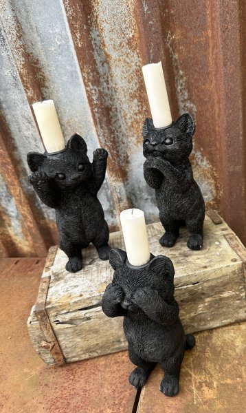 Söt svart ljusstake katt 