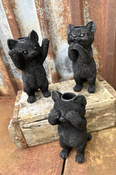 Söt svart ljusstake katt 