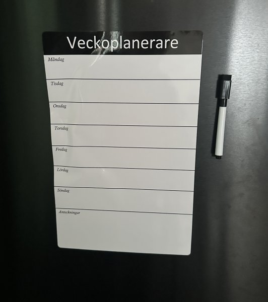 Magnetisk veckoplanerare med penna