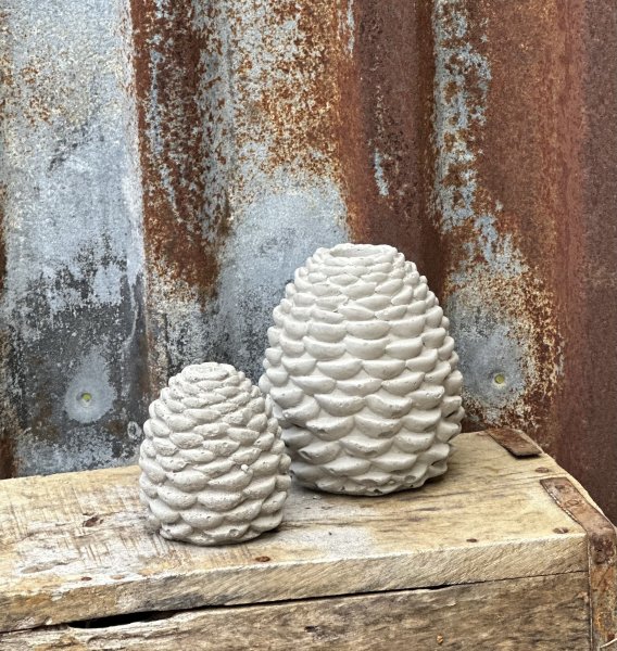 Betong kotte och ljusstake kotte 