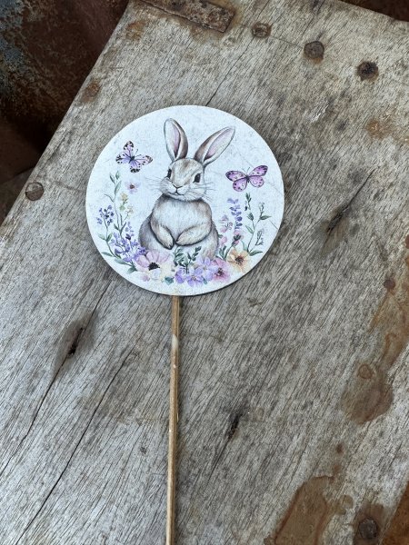 Gulligt påsk stick med kanin med blommor