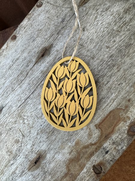 Gult påsk tags med tulpaner i ägg